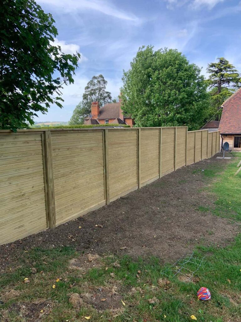 This is a photo of an acoustic fence installed by Fast Fix Fencing Sutton