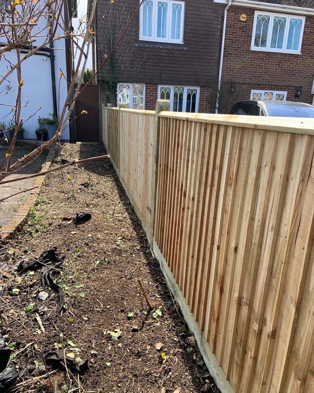 This is a photo of feather edge fencing installed in a residential property by Fast Fix Fencing Sutton